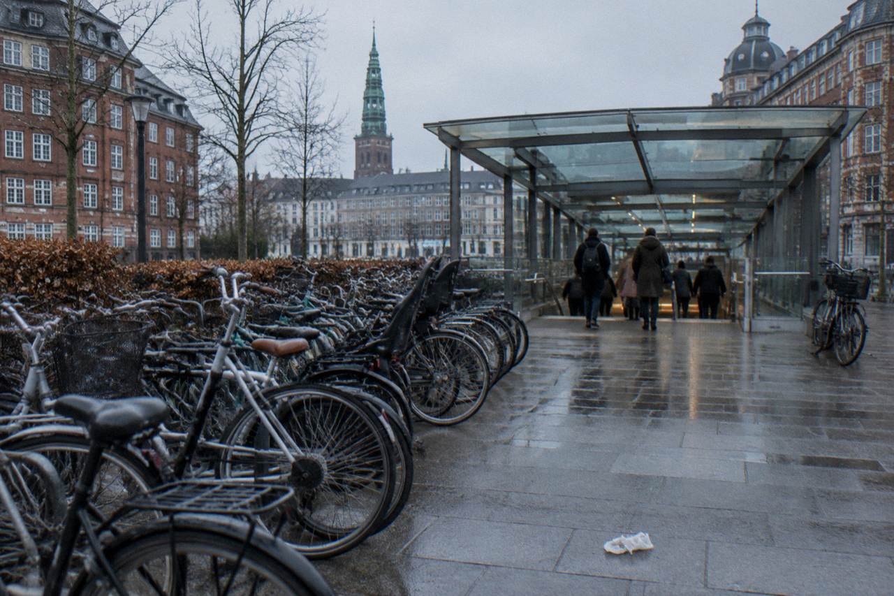 A Copenhagen metro platform with a driverless train waiting at the station