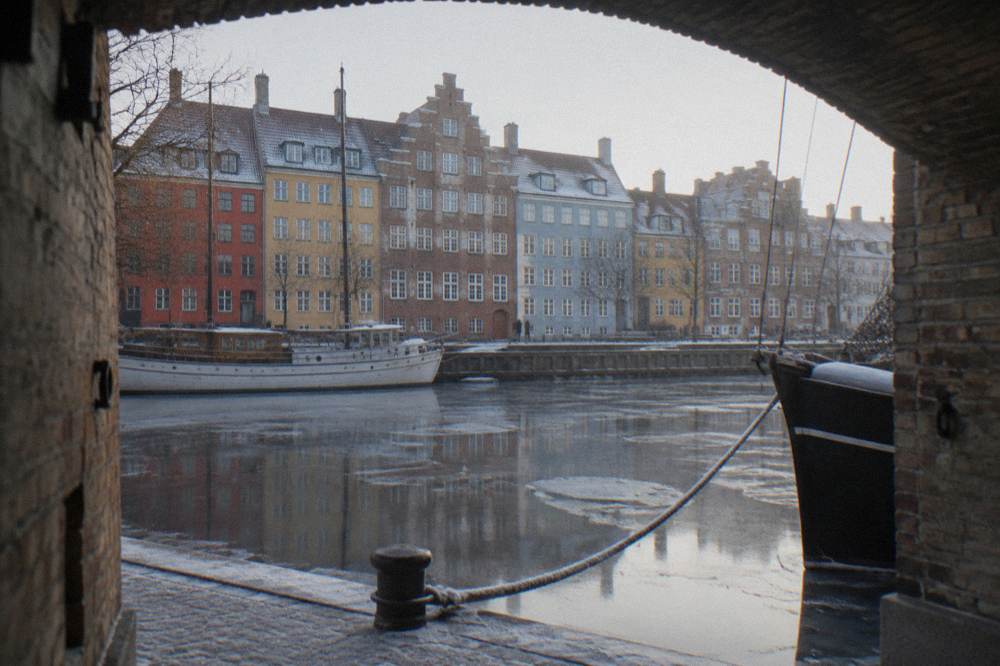 Canal-side coloured townhouses in Christianshavn near the route to Christiania