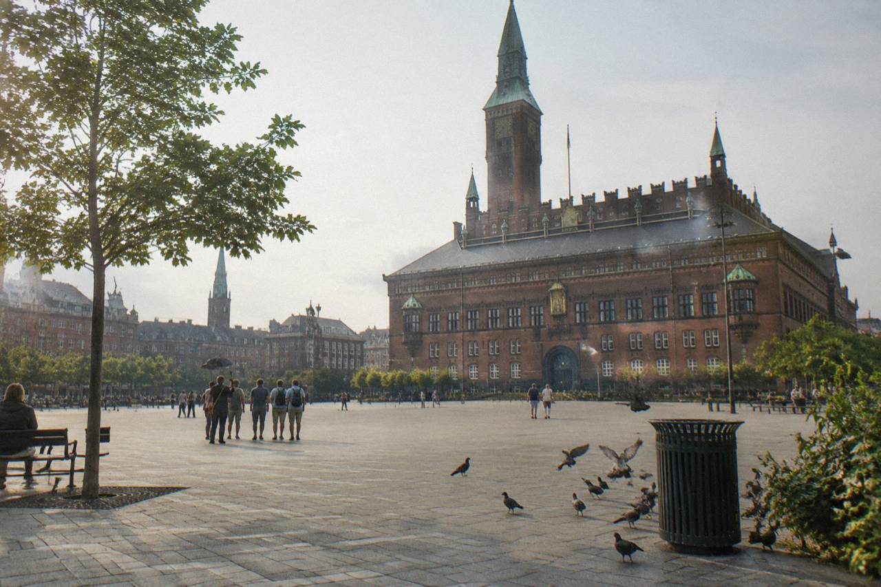 Copenhagen City Hall square with the building's ornate facade above an open plaza