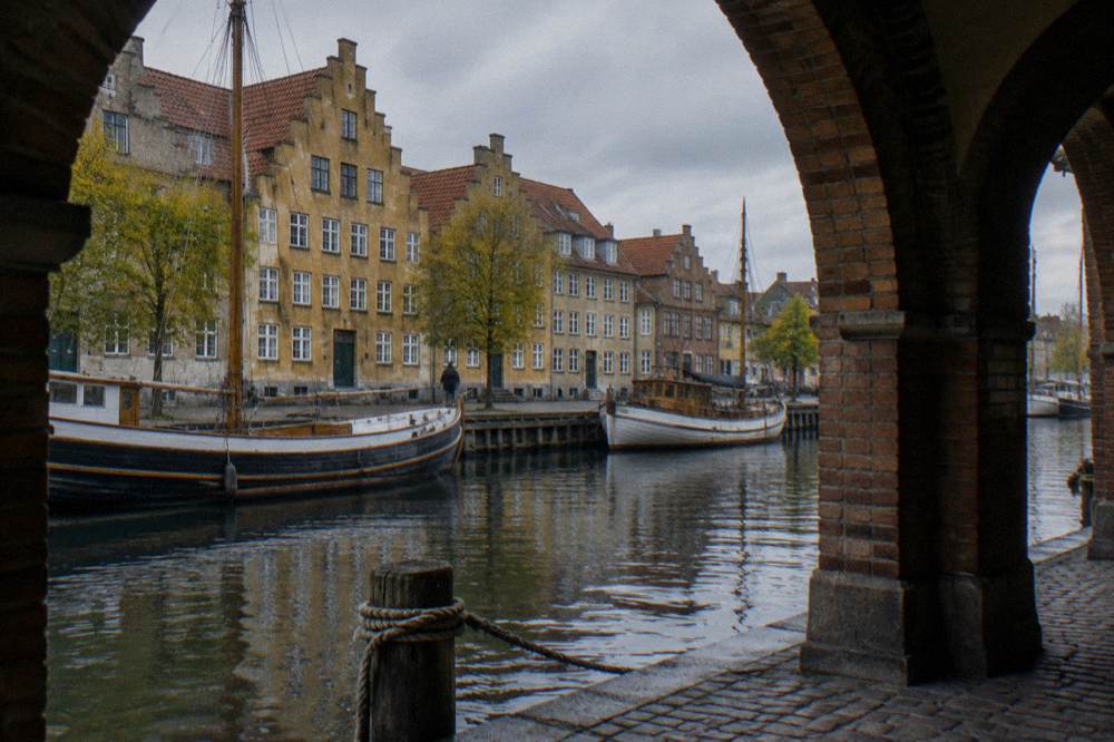 Canal in Christianshavn with historic townhouses and moored boats