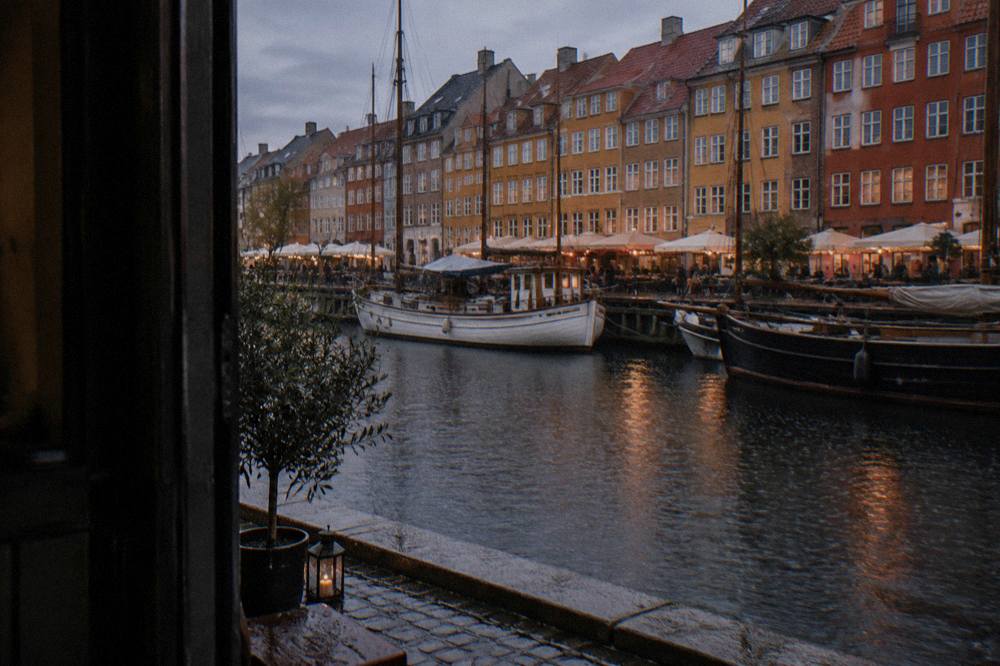 Copenhagen canal lined with colourful historic townhouses