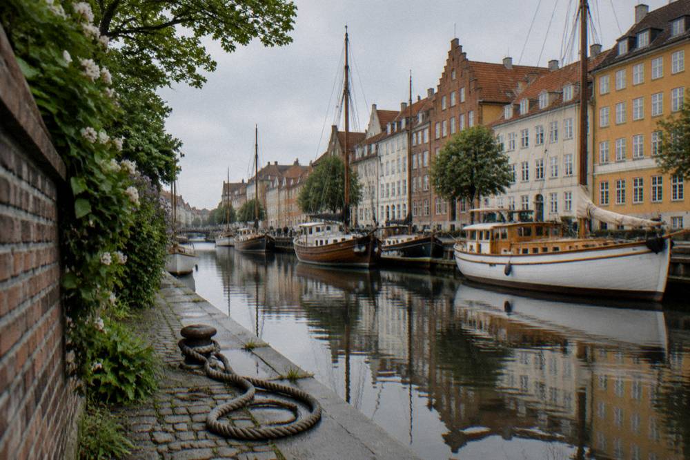 Canal-side houses in Christianshavn with boats moored along the water